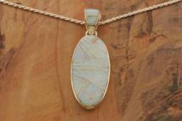Calvin Begay Fire and Ice Opal Sterling Silver Pendant